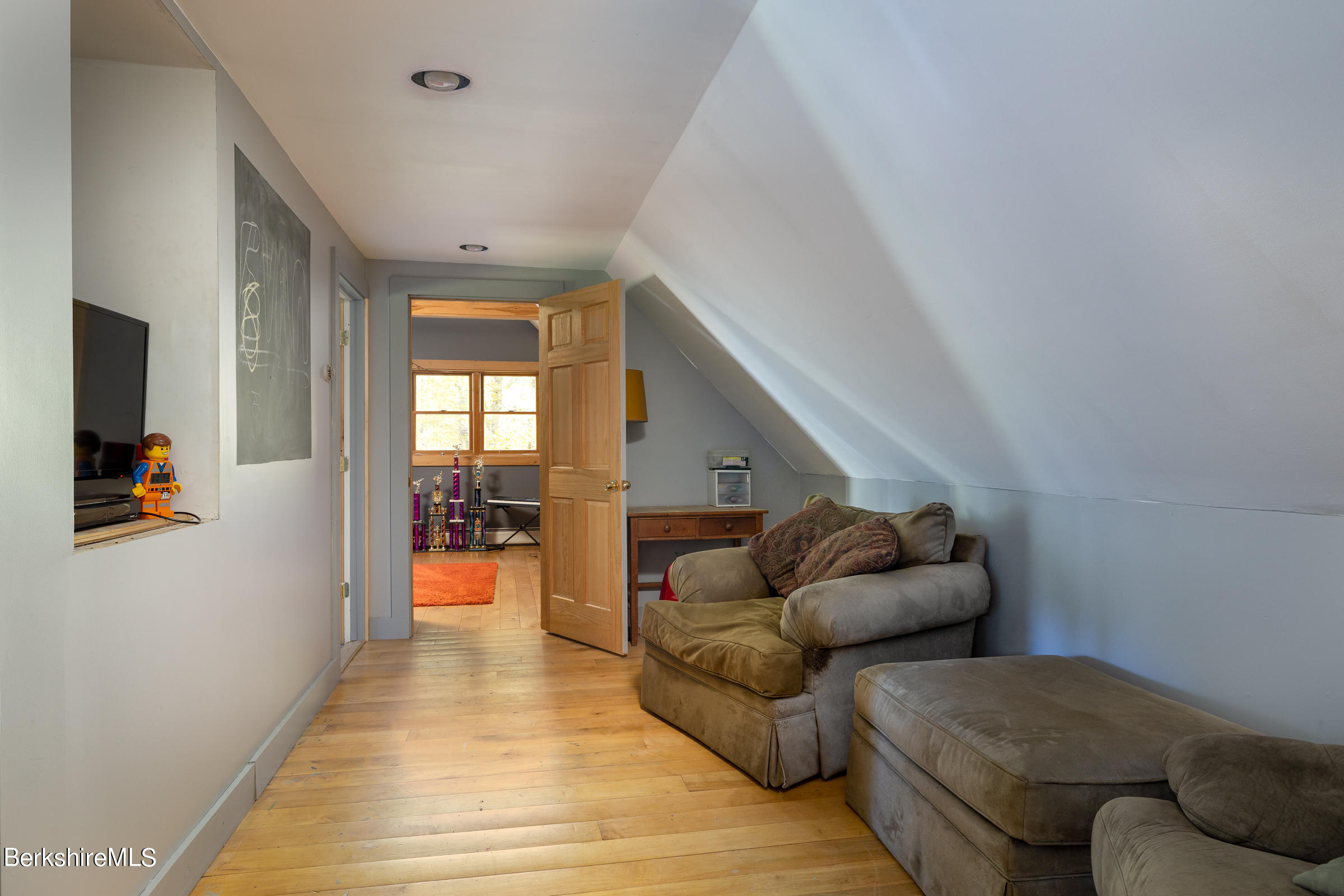235 Main Road Monterey, MA 01245 - Photo 17 of 37 a living room with furniture and a large window