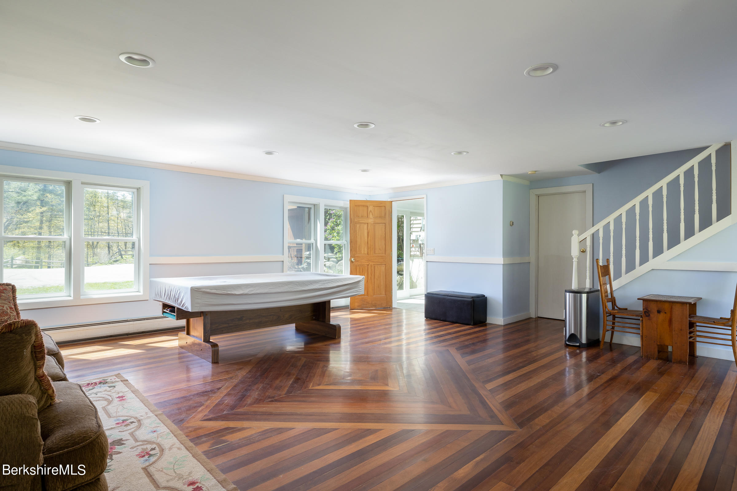 235 Main Road Monterey, MA 01245 - Photo 21 of 37 a living room with furniture and a wooden floor