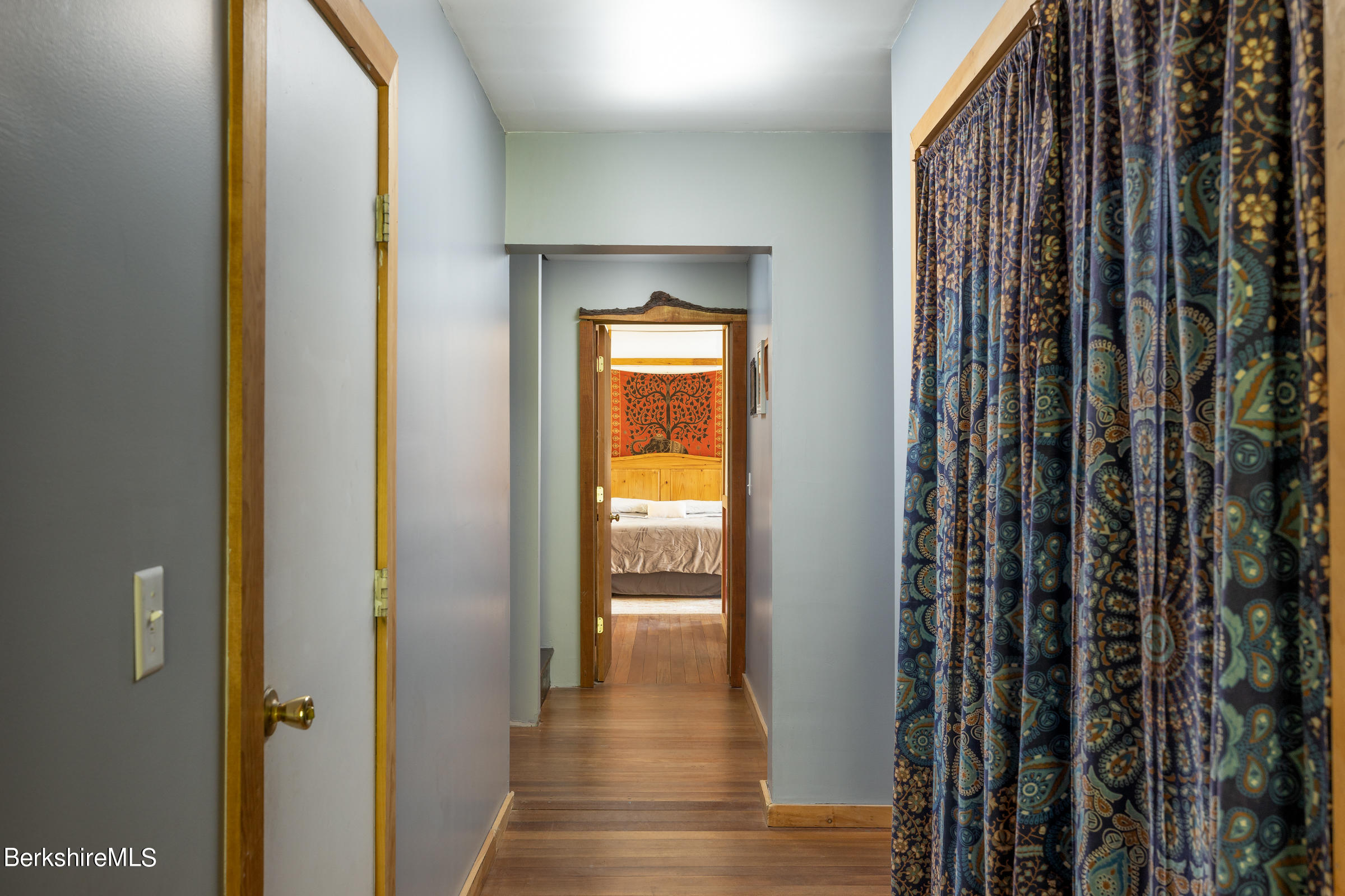 235 Main Road Monterey, MA 01245 - Photo 35 of 37 a view of a hallway with a wooden door