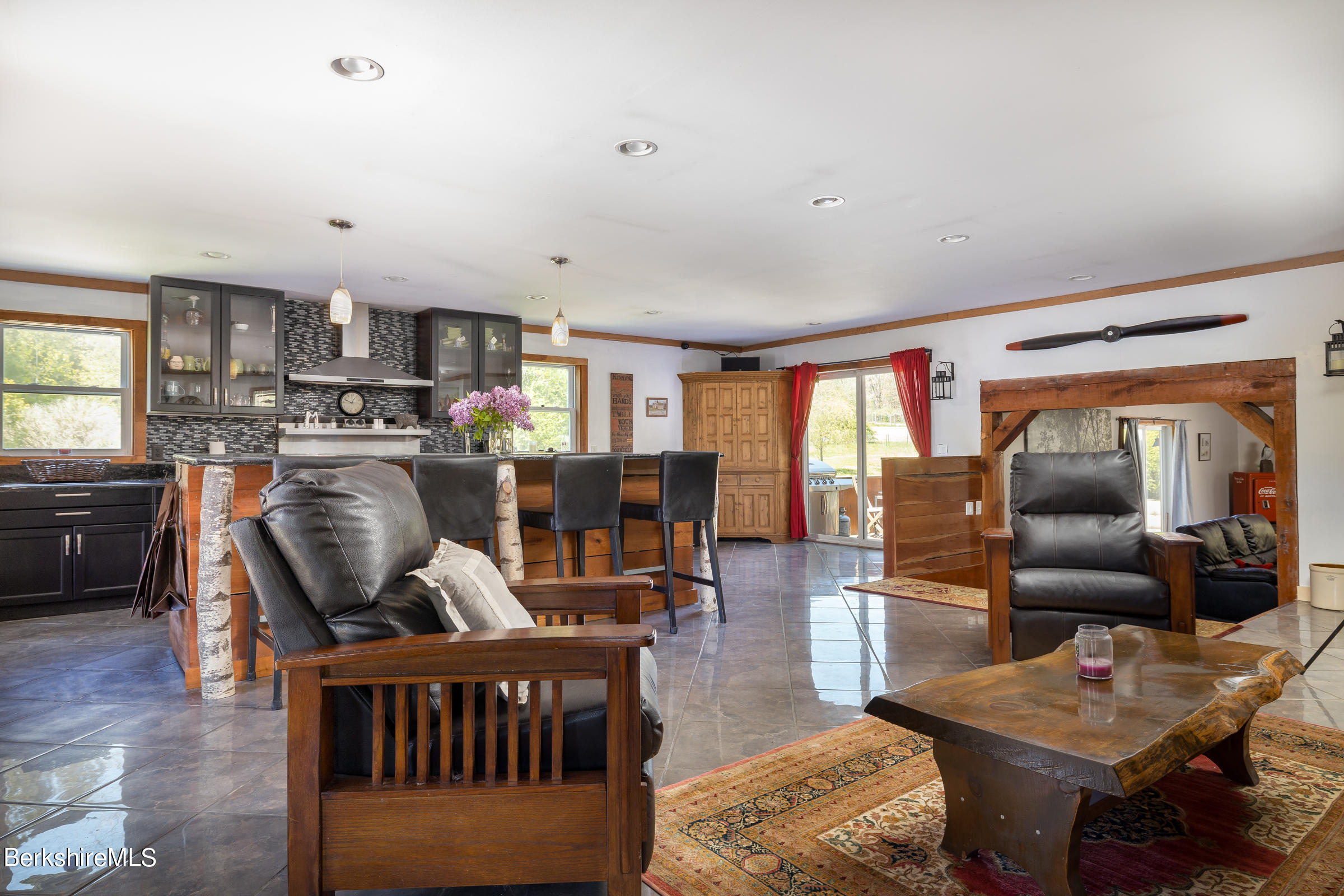 235 Main Road Monterey, MA 01245 - Photo 5 of 37 a living room with furniture and a wooden floor