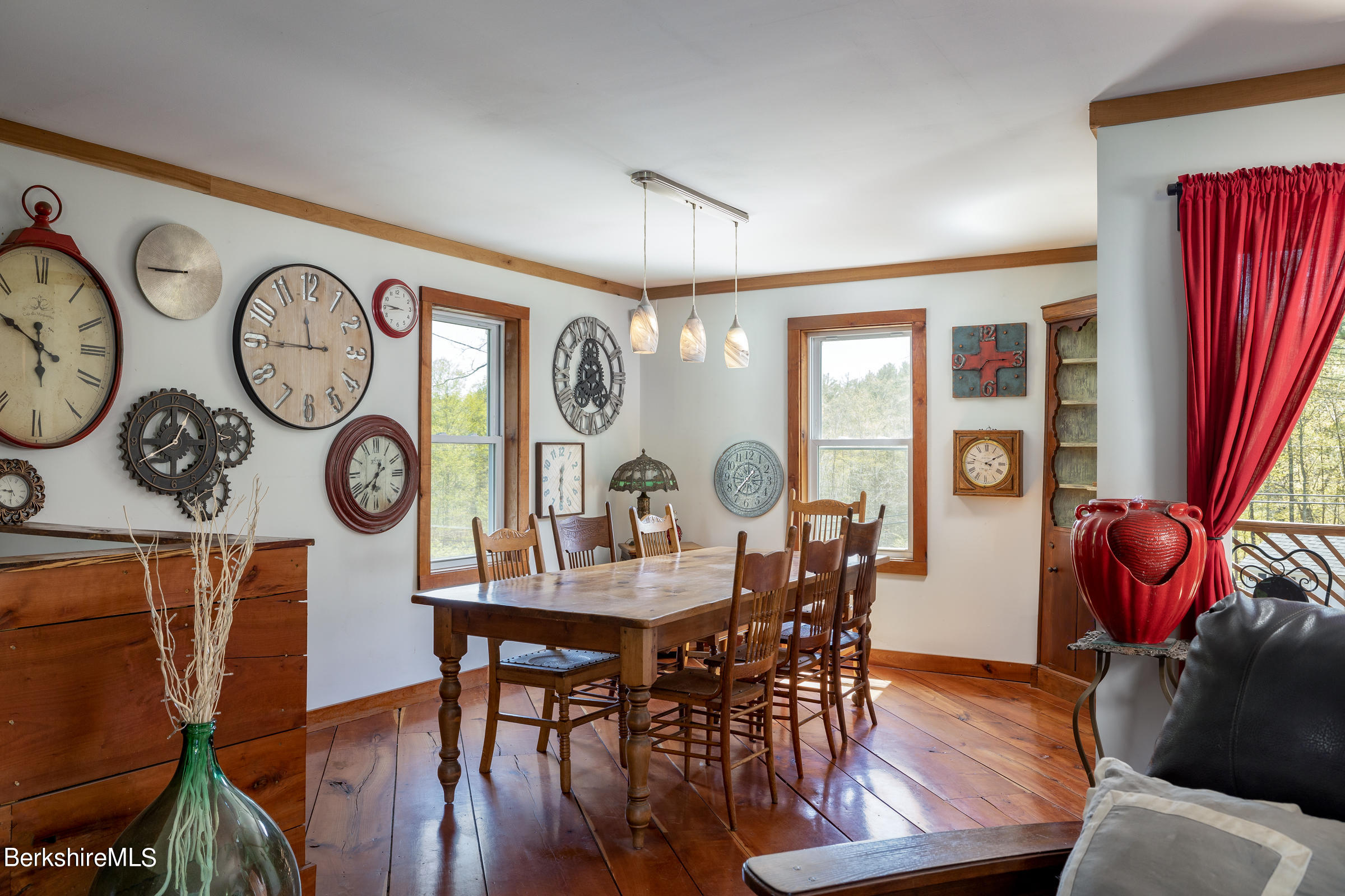 235 Main Road Monterey, MA 01245 - Photo 7 of 37 a view of a dining room with furniture window and wooden floor