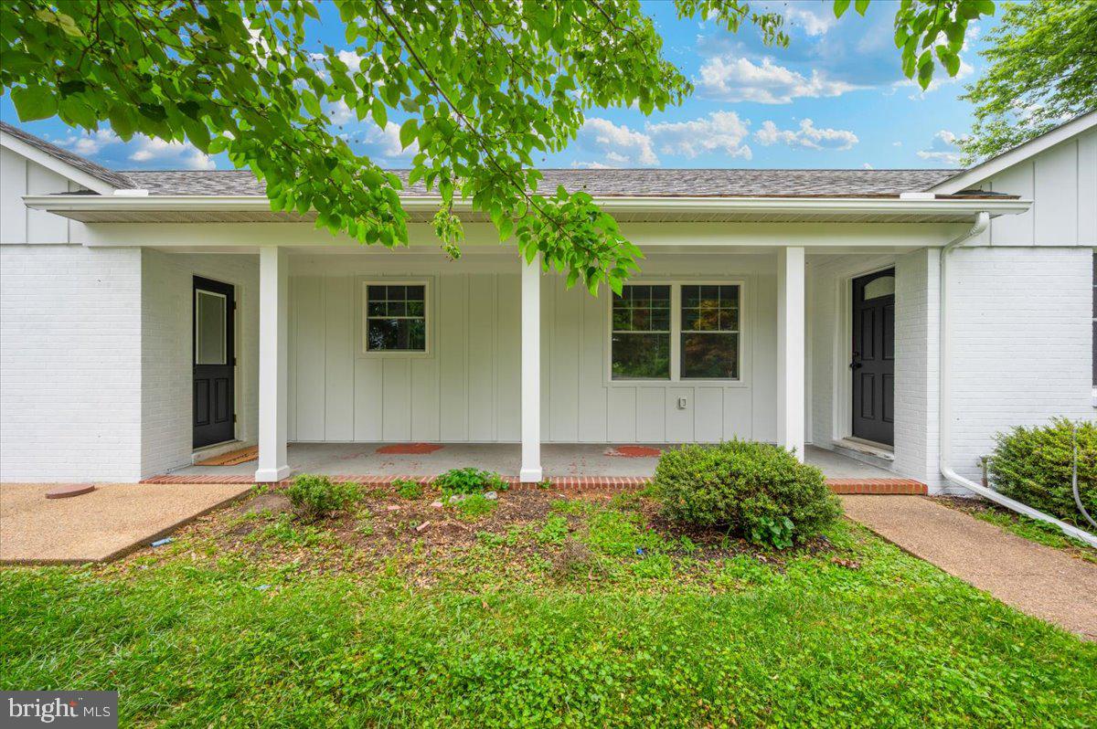 1802 Ridge Road Westminster, MD 21157 - Photo 2 of 47 front view of a house with a yard
