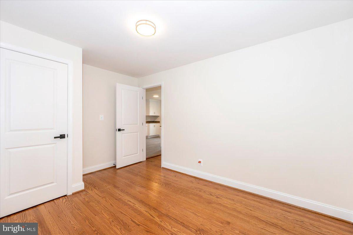 1802 Ridge Road Westminster, MD 21157 - Photo 23 of 47 a view of a room with wooden floor and white walls