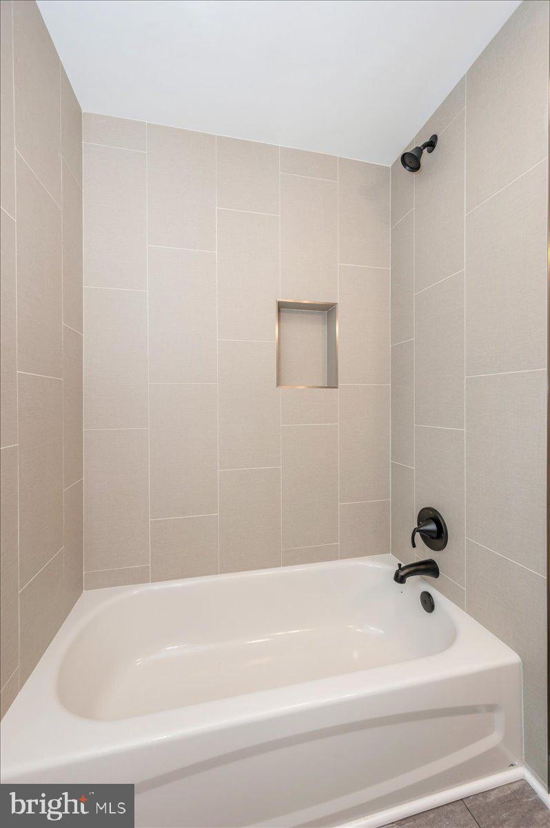 1802 Ridge Road Westminster, MD 21157 - Photo 25 of 47 a bathroom with a bathtub