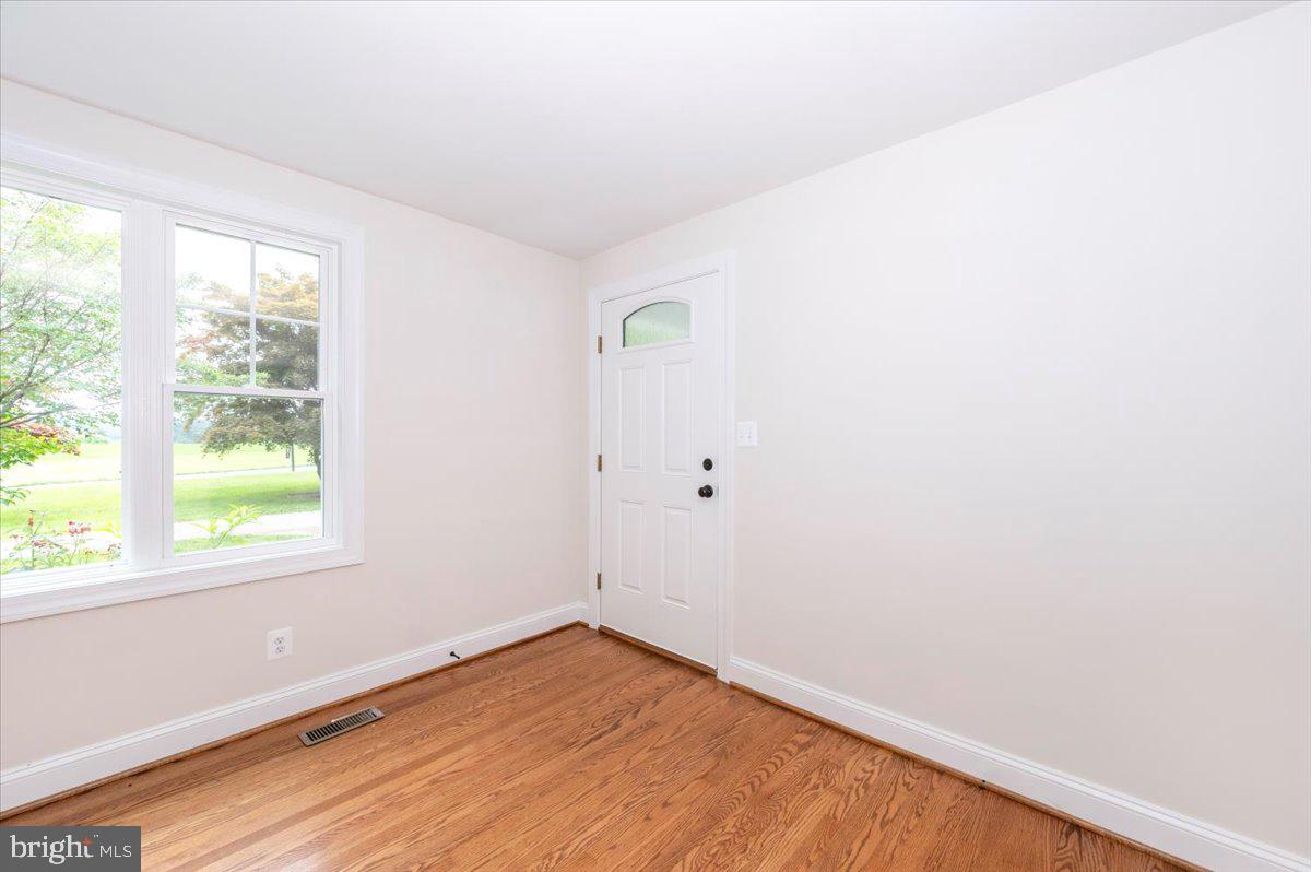 1802 Ridge Road Westminster, MD 21157 - Photo 3 of 47 an empty room with a window