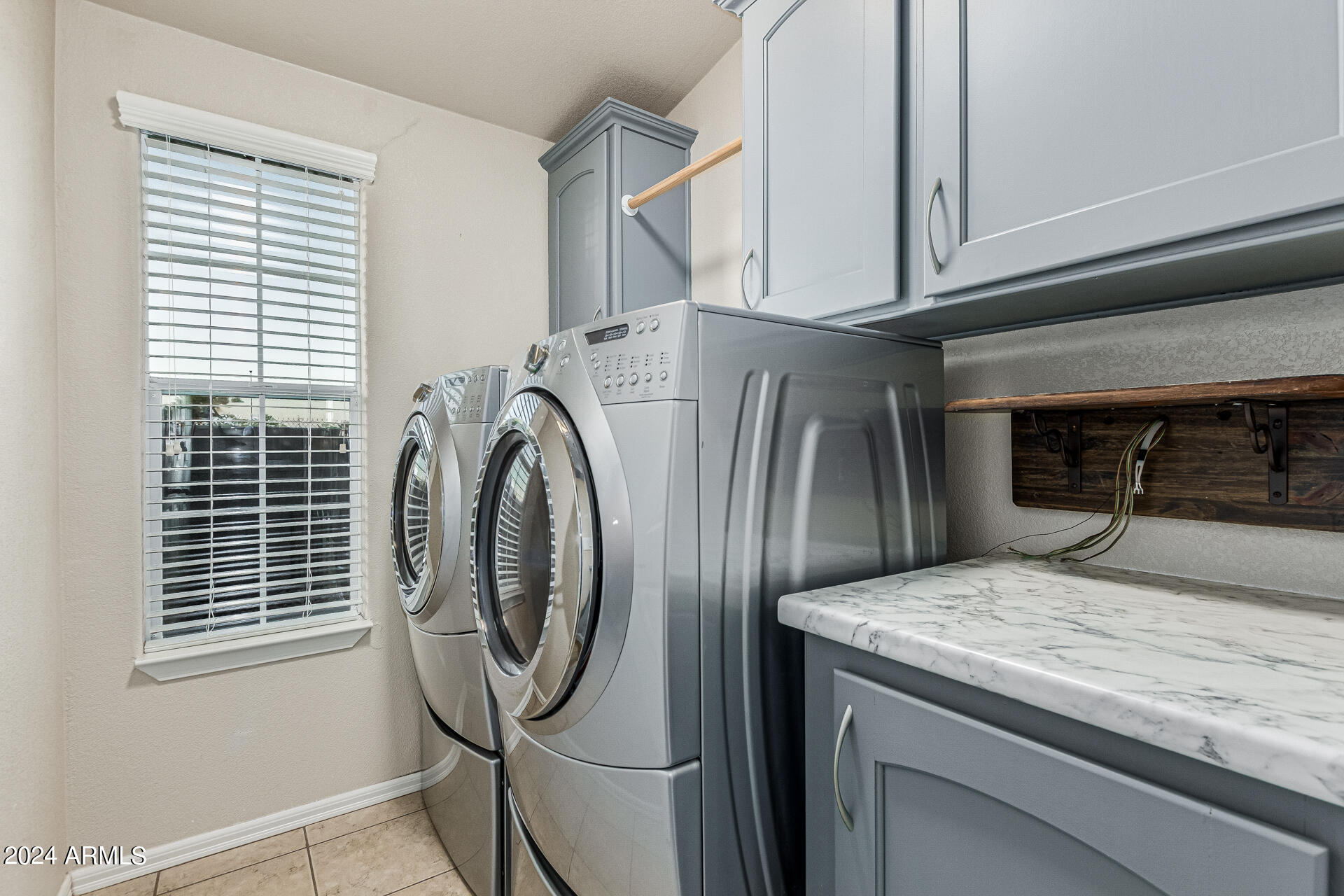 3301 South Goldfield Road, Unit 4037 Apache Junction, AZ 85119 - Photo 28 of 36 a utility room with dryer and washer