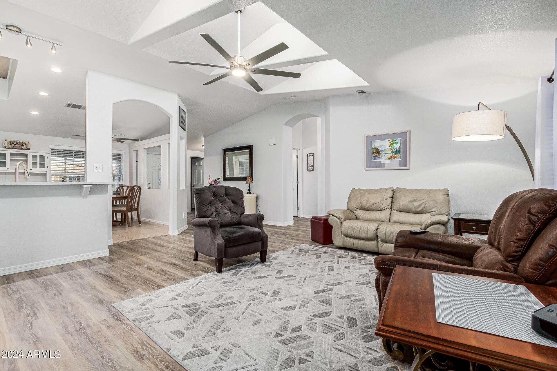 3301 South Goldfield Road, Unit 4037 Apache Junction, AZ 85119 - Photo 8 of 36 a living room with furniture