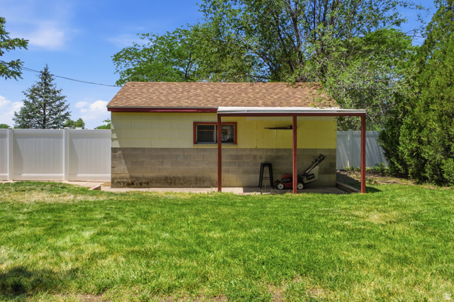 94 West 2000th Street North Clearfield, UT 84015 - Photo 24 of 26 Detached garage with covered side area, perfect for storage, tools, or outdoor projects.