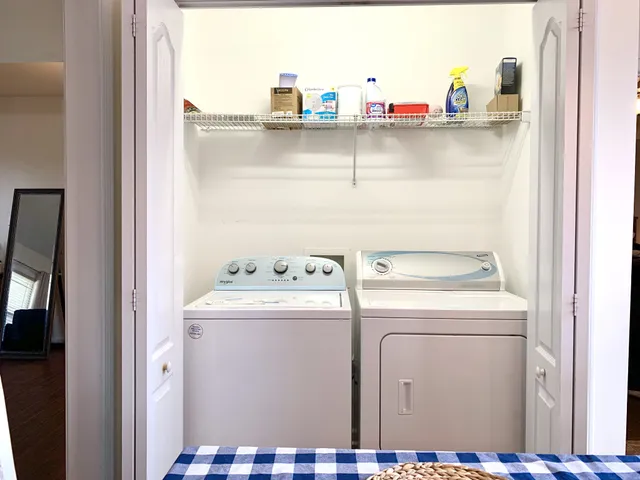 a utility room with dryer and washer