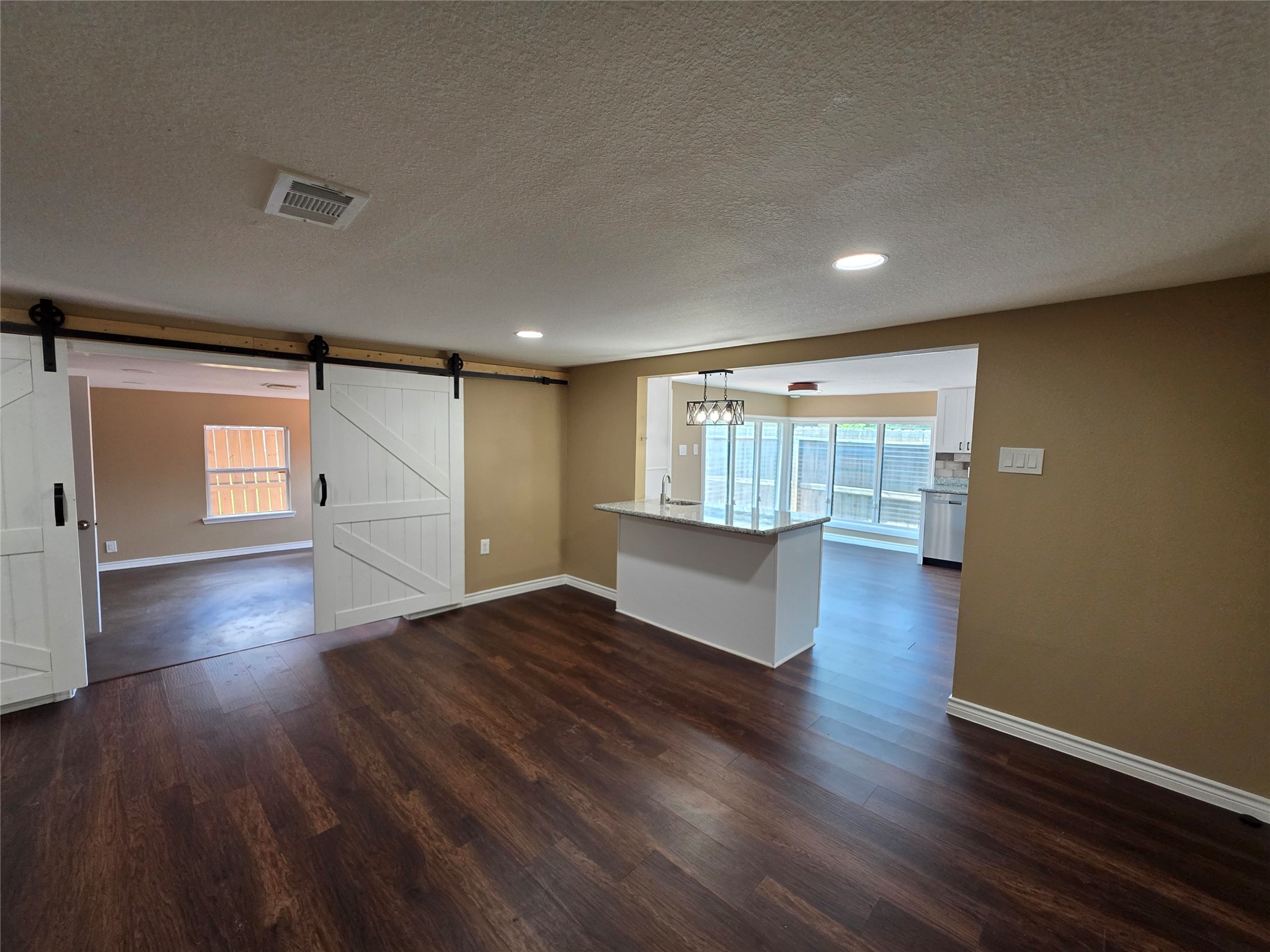 4105 Rutland Street Houston, TX 77018 - Photo 25 of 34 Another view of the living room area and flex space right behind!