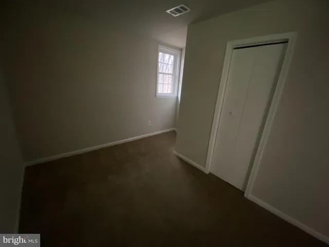 an empty room with a door