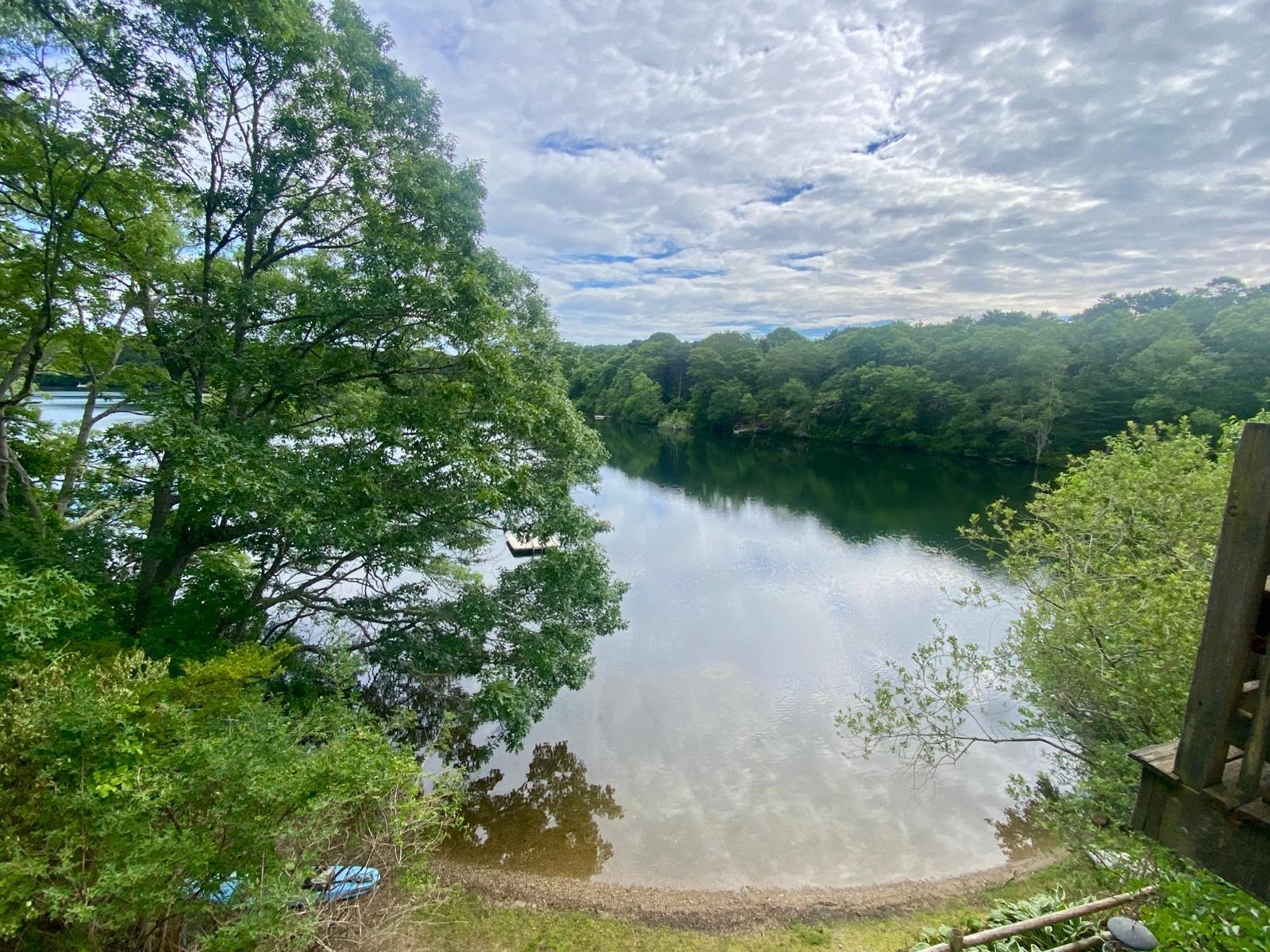 35 Parker Road, Unit 26 East Falmouth, MA 02536 - Photo 4 of 4 a view of a lake from a yard