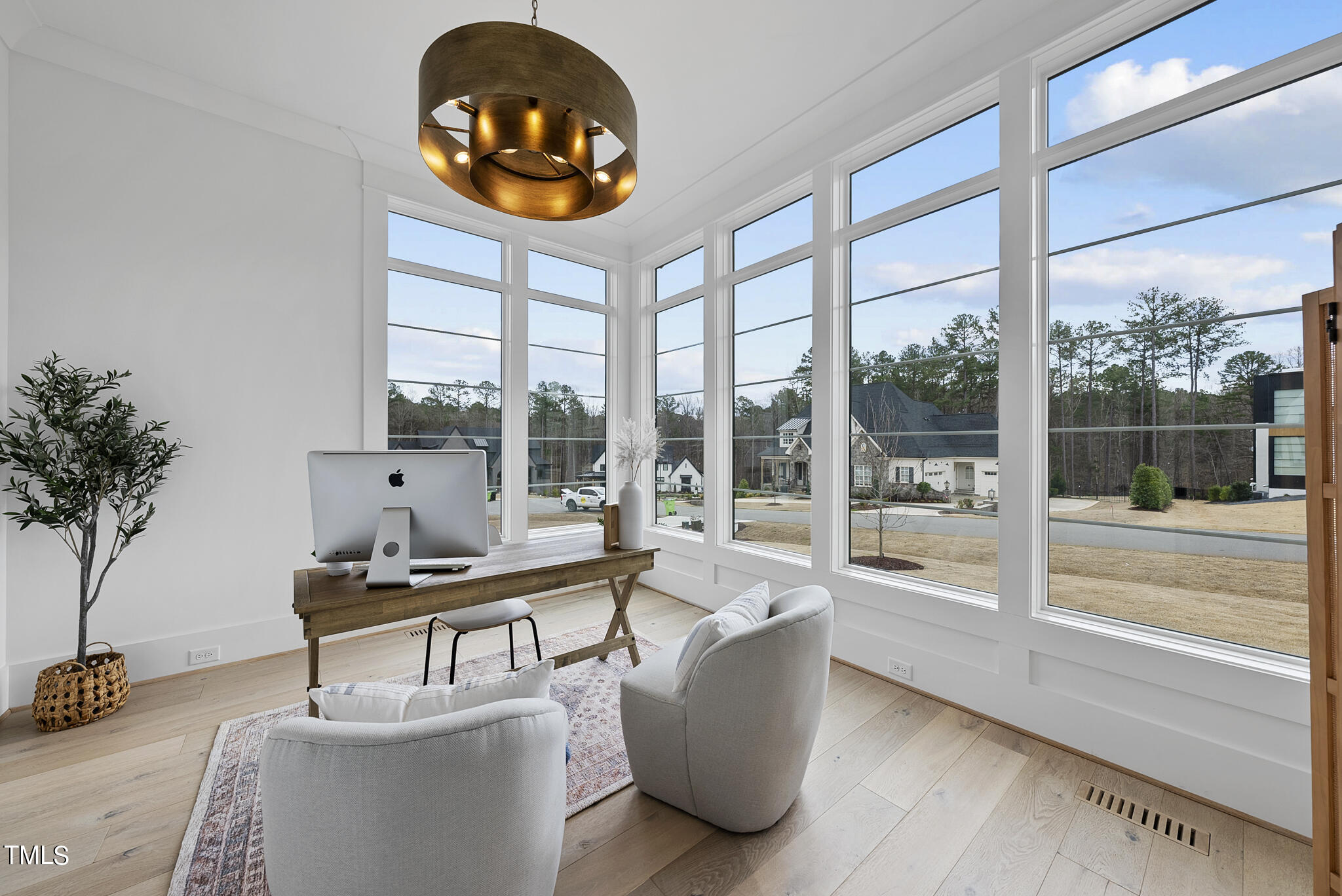 5020 Winding View Lane Raleigh, NC 27615 - Photo 20 of 63 a living room with furniture and a large window