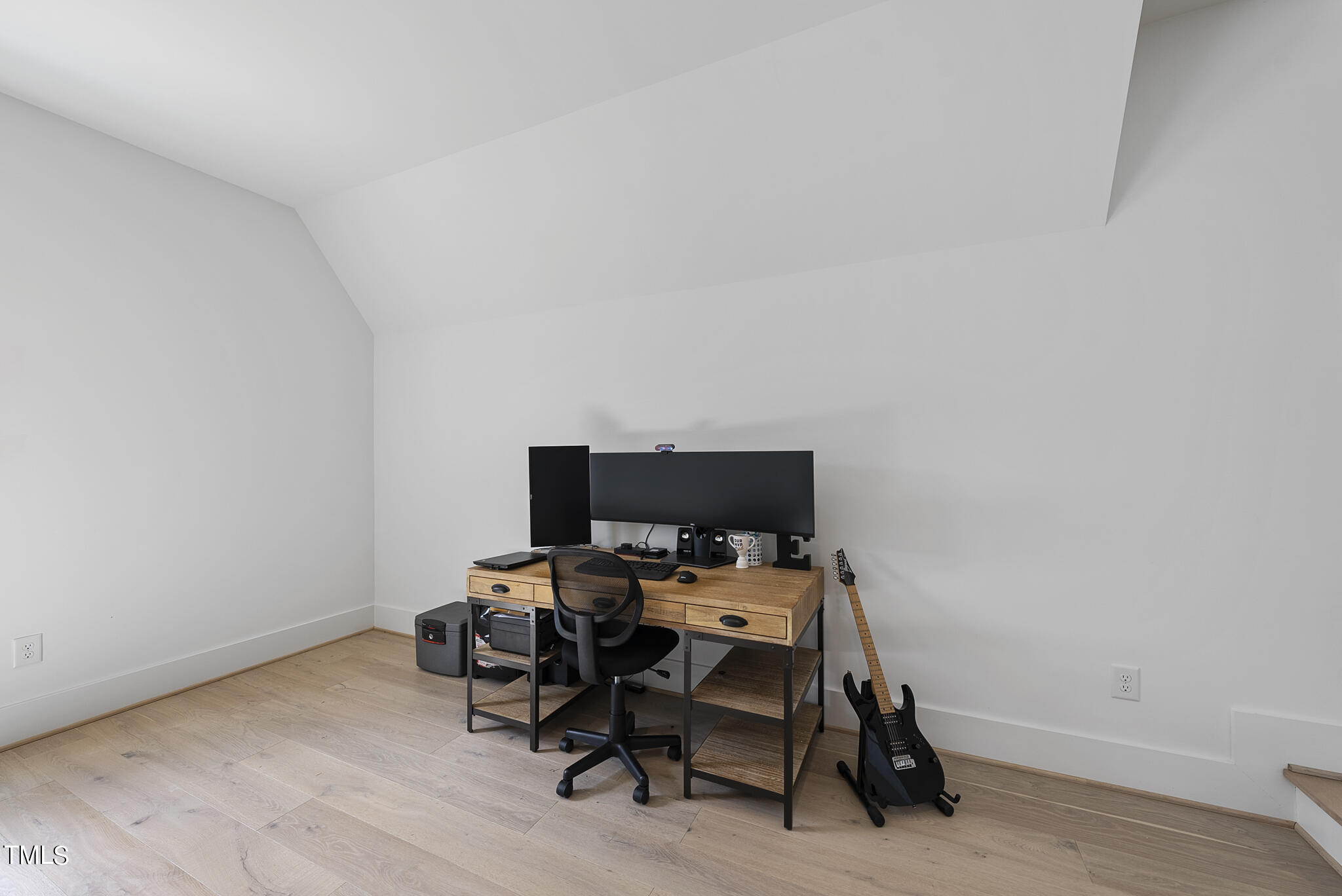 5020 Winding View Lane Raleigh, NC 27615 - Photo 51 of 63 a view of a workspace with furniture and a window