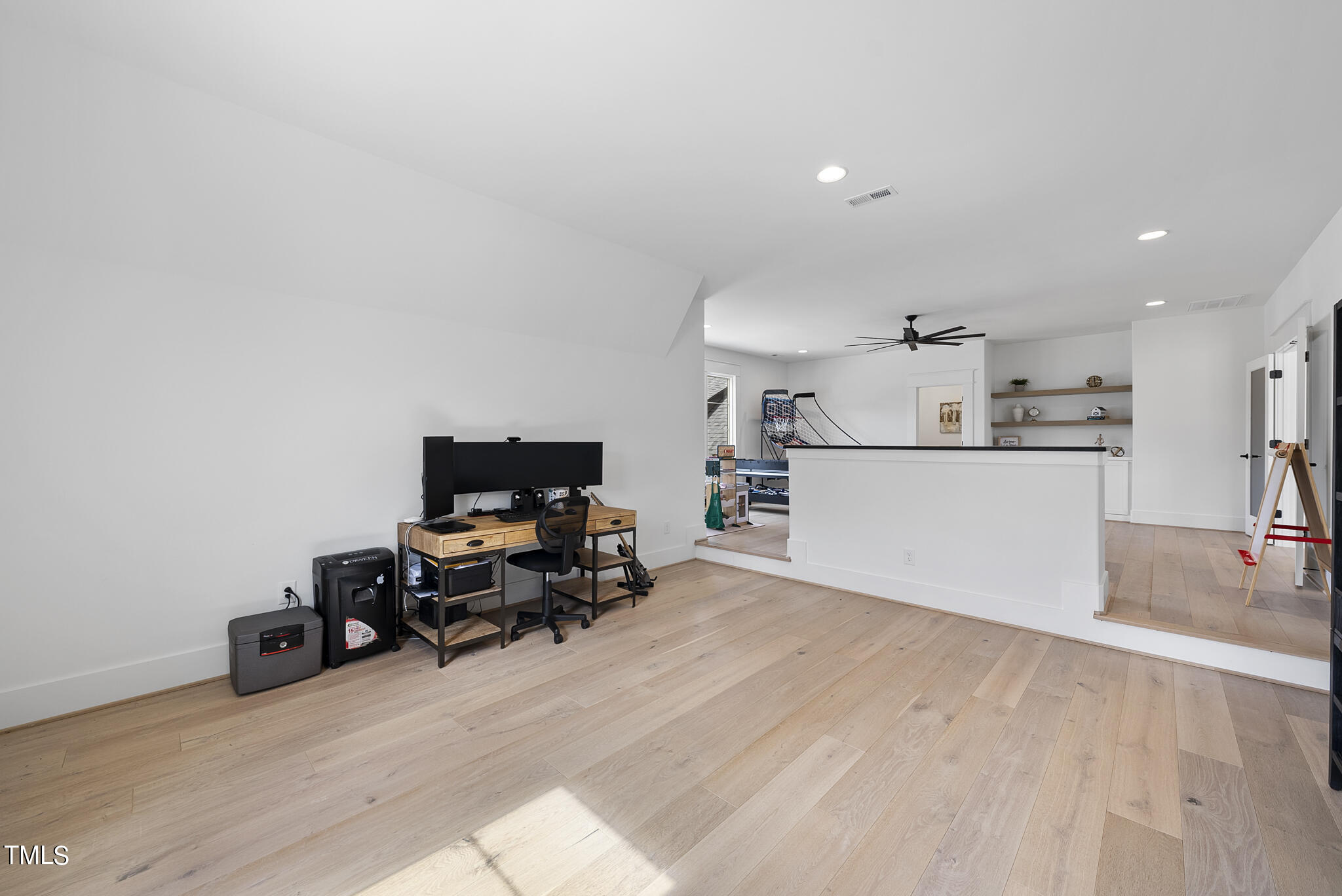 5020 Winding View Lane Raleigh, NC 27615 - Photo 52 of 63 a view of a kitchen with furniture and wooden floor