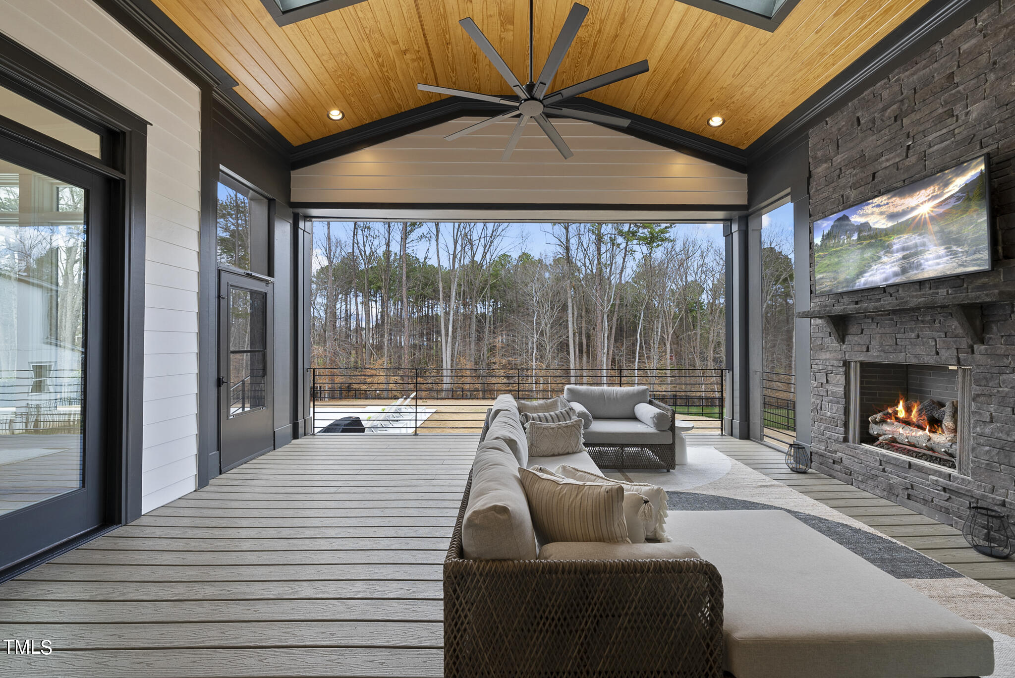 5020 Winding View Lane Raleigh, NC 27615 - Photo 54 of 63 a outdoor space with patio the couches and a fireplace with a potted plant