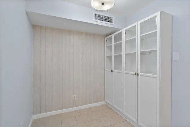 a view of an empty walk in closet