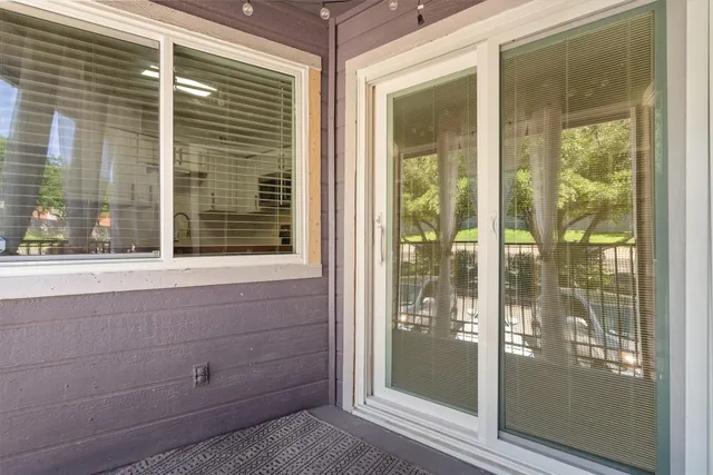 a view of a glass door with a glass door