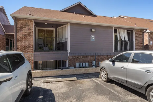 a car parked in front of a house