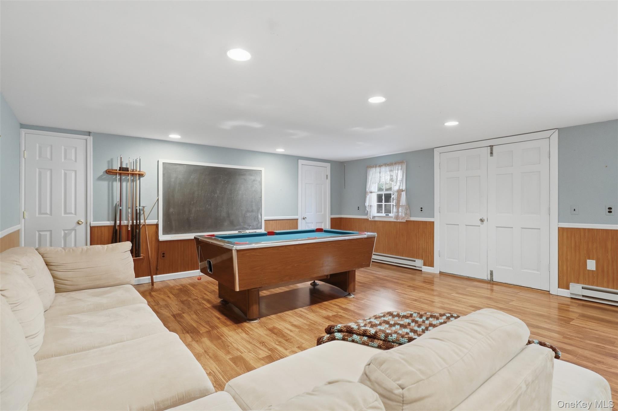 89 West Ridge Road Warwick, NY 10990 - Photo 26 of 37 Partially finished lower level ~ recreation space for movie nights, game nights, entertaining