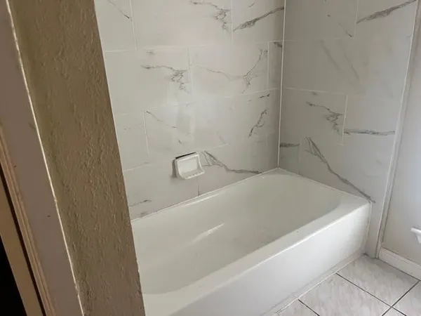 a bathroom with a bathtub