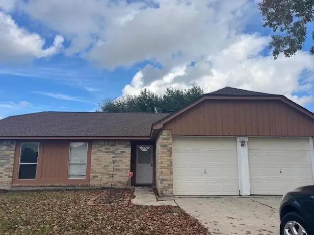 a house view with a backyard space
