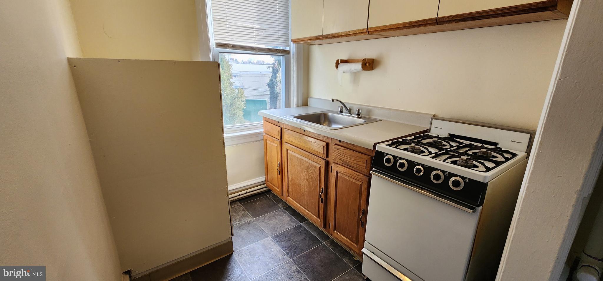 33 South York Road, Unit 2A Hatboro, PA 19040 - Photo 5 of 12 Kitchen w/ new range to be installed.