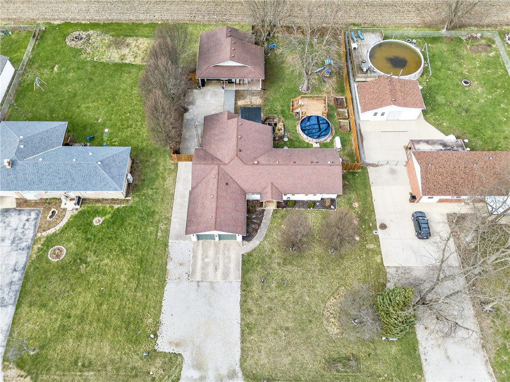 7888 Darke-Preble County Line Road Arcanum, OH 45304 - Photo 45 of 51 An aerial view captures the property, highlighting its spacious outdoor amenities and convenient layout.
