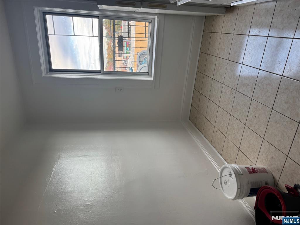 311 Queen Anne Road, Unit 46 Teaneck, NJ 07666 - Photo 2 of 6 a bathroom with a toilet