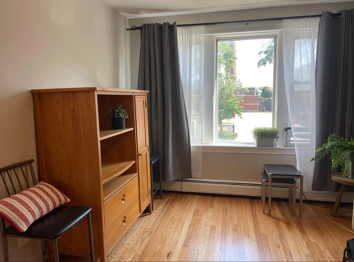 6010 West Seminole Street, Unit 2 Chicago, IL 60646 - Photo 11 of 14 a view of room with window and wooden floor