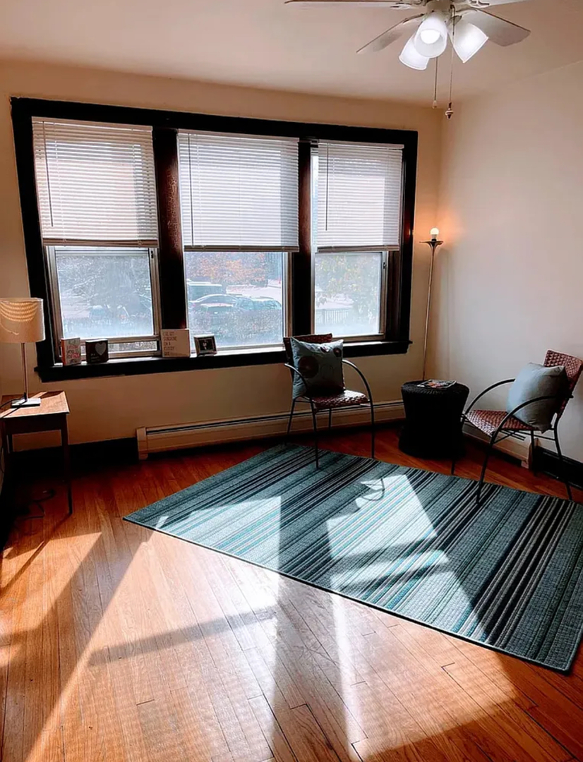 6010 West Seminole Street, Unit 2 Chicago, IL 60646 - Photo 12 of 14 a living room with large window