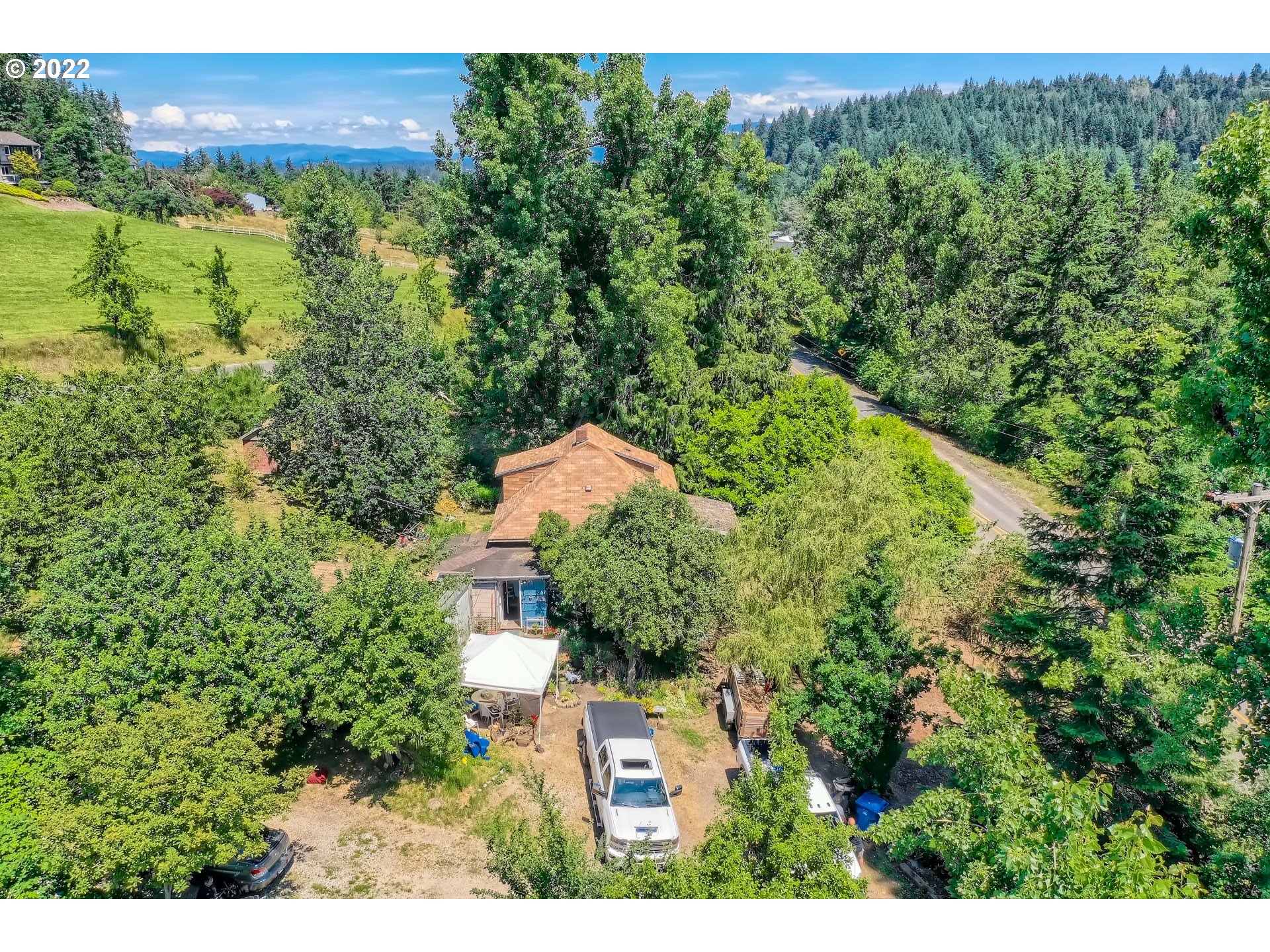 24011 Southeast Borges Road Damascus, OR 97089 - Photo 4 of 21 an aerial view of a house with a yard