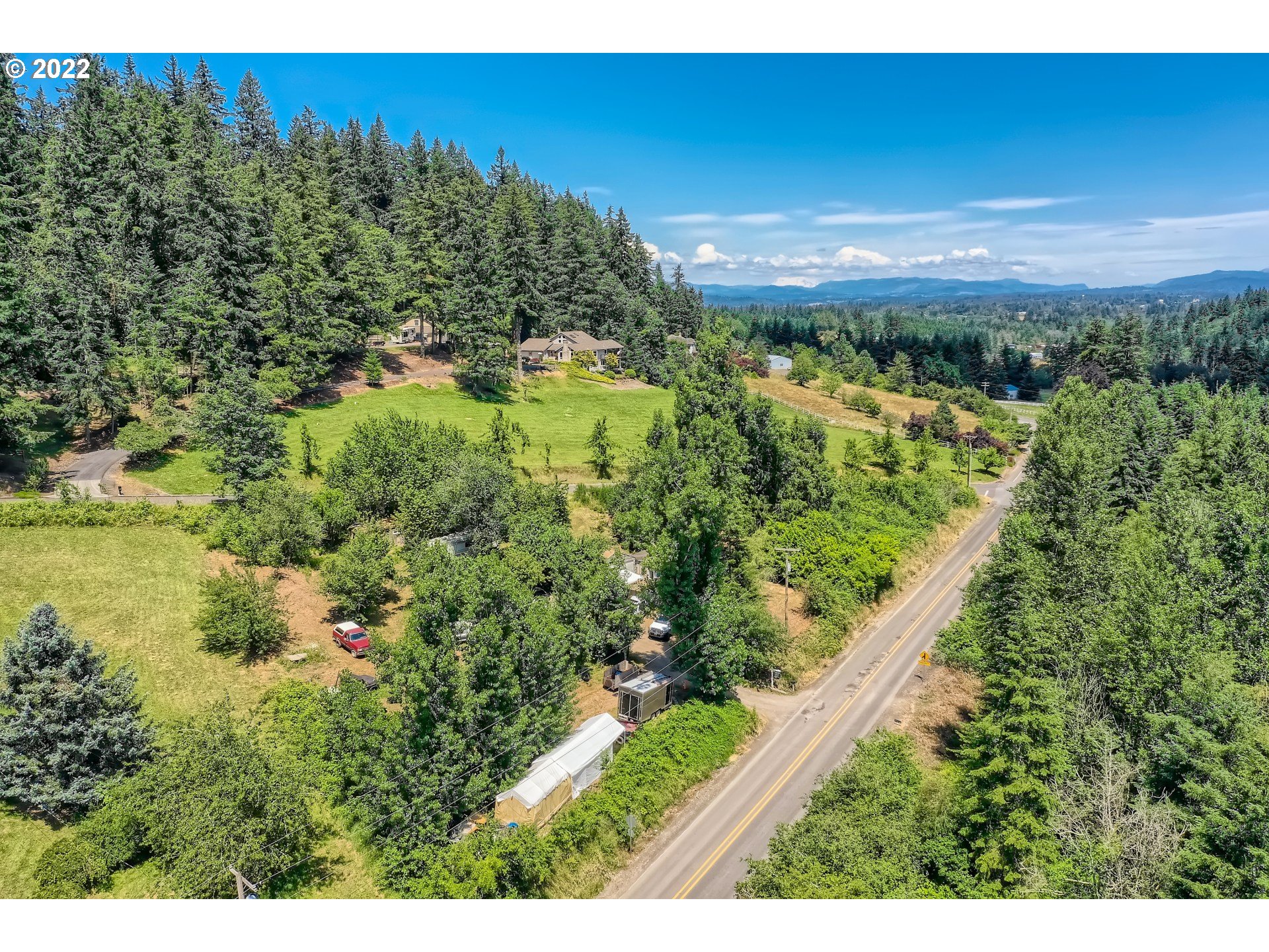 24011 Southeast Borges Road Damascus, OR 97089 - Photo 9 of 21 a view of a yard with an outdoor space