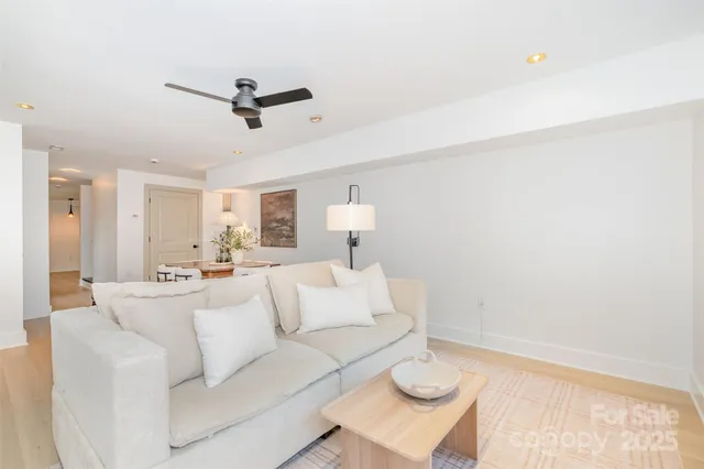 a view of a backyard with large trees