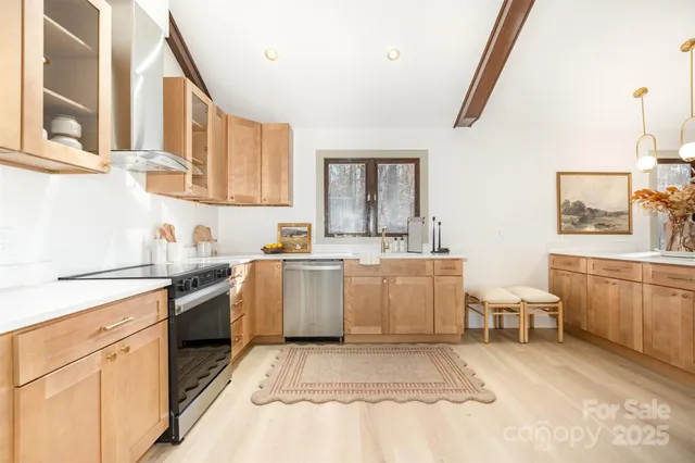 a bathroom with a sink a mirror and a bathtub