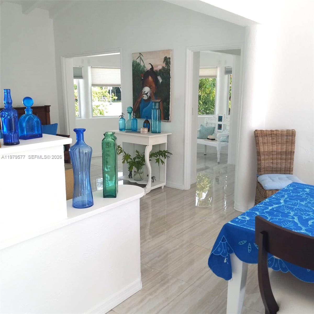 6910 Rue Notre Dame Miami Beach, FL 33141 - Photo 6 of 24 a living room with furniture and wooden floor