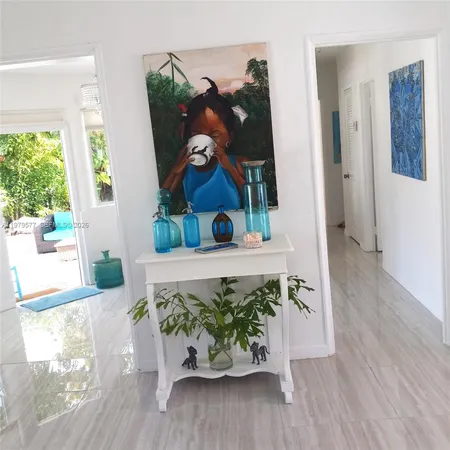 a living room with wooden floor