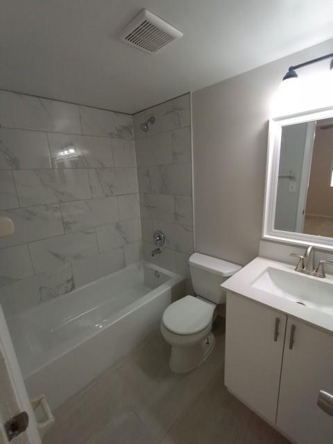 2641 Riverside Drive, Unit 5 Coral Springs, FL 33065 - Photo 12 of 27 a bathroom with a sink toilet and shower