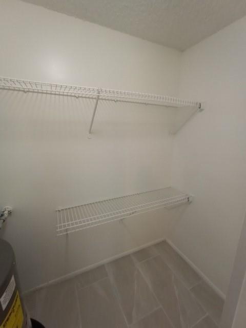 2641 Riverside Drive, Unit 5 Coral Springs, FL 33065 - Photo 13 of 27 a view of a room with racks on the wall
