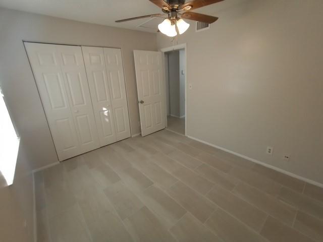 2641 Riverside Drive, Unit 5 Coral Springs, FL 33065 - Photo 17 of 27 an empty room with a window