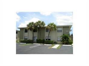 2641 Riverside Drive, Unit 5 Coral Springs, FL 33065 - Photo 2 of 27 a view of a house with a yard