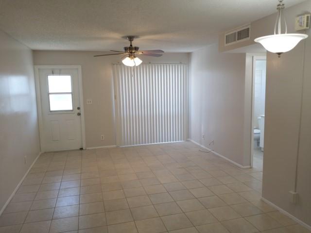 2641 Riverside Drive, Unit 5 Coral Springs, FL 33065 - Photo 3 of 27 a view of an empty room with a window