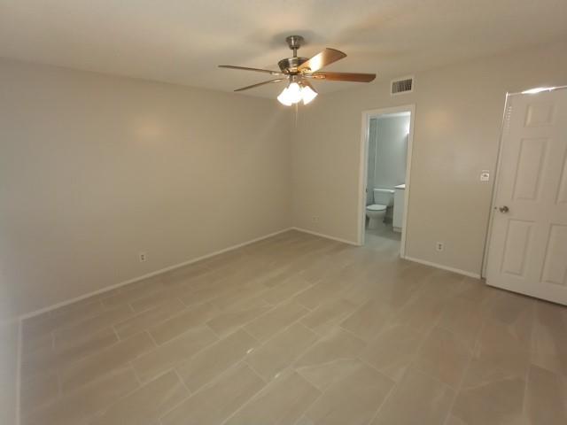 2641 Riverside Drive, Unit 5 Coral Springs, FL 33065 - Photo 8 of 27 wooden floor in an empty room