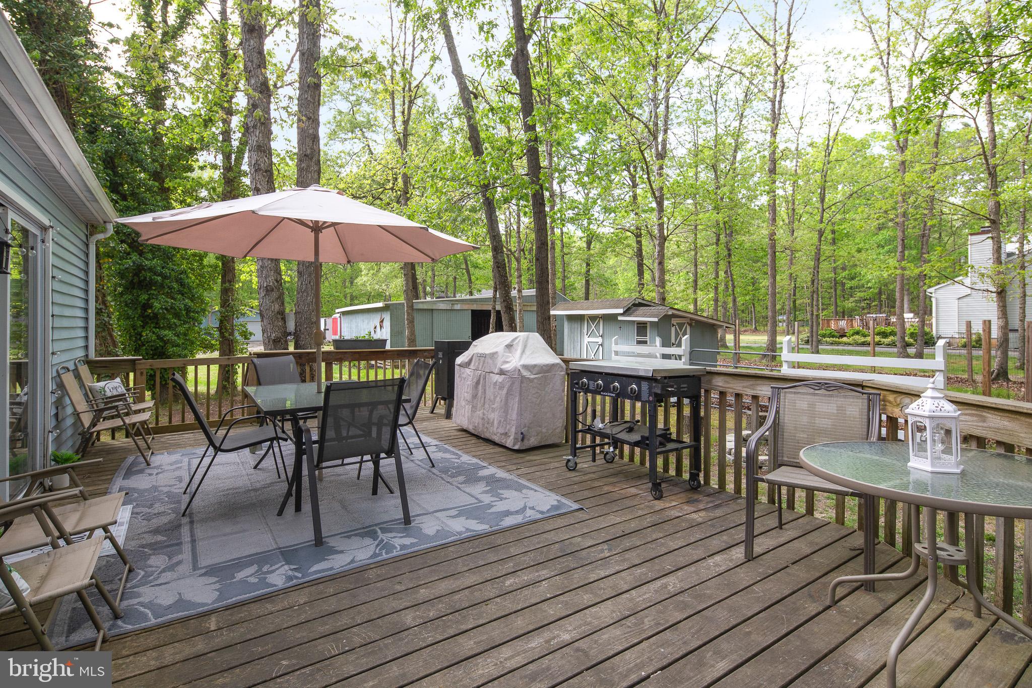 813 Whitehall Road Newfield, NJ 08344 - Photo 3 of 35 Backyard deck for entertaining.