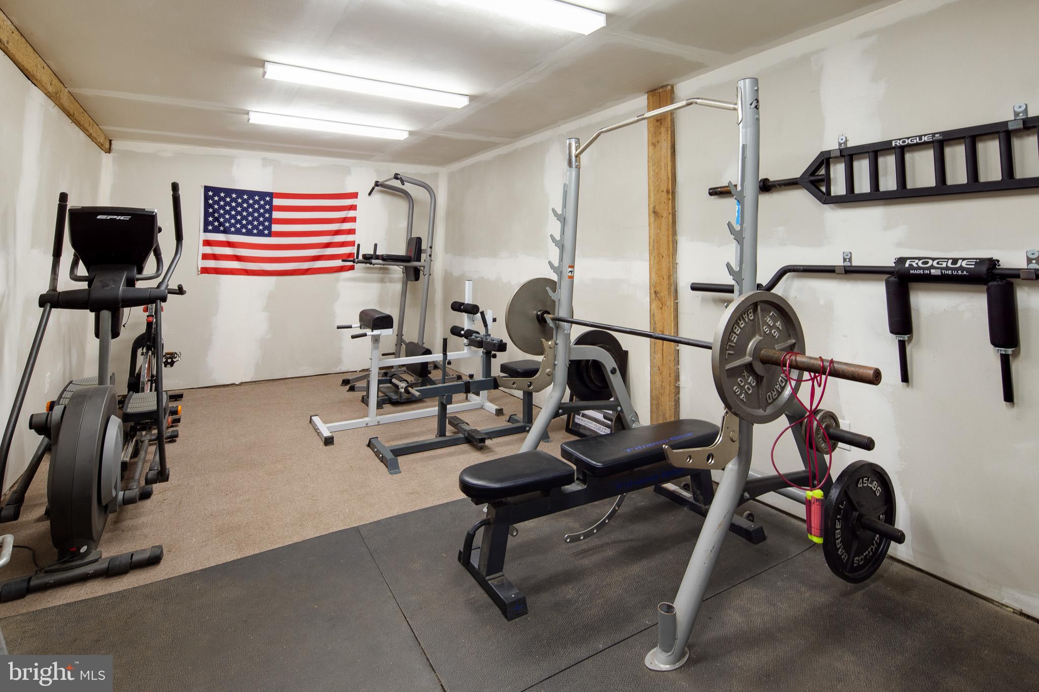 813 Whitehall Road Newfield, NJ 08344 - Photo 22 of 35 Basement w/ gym area.