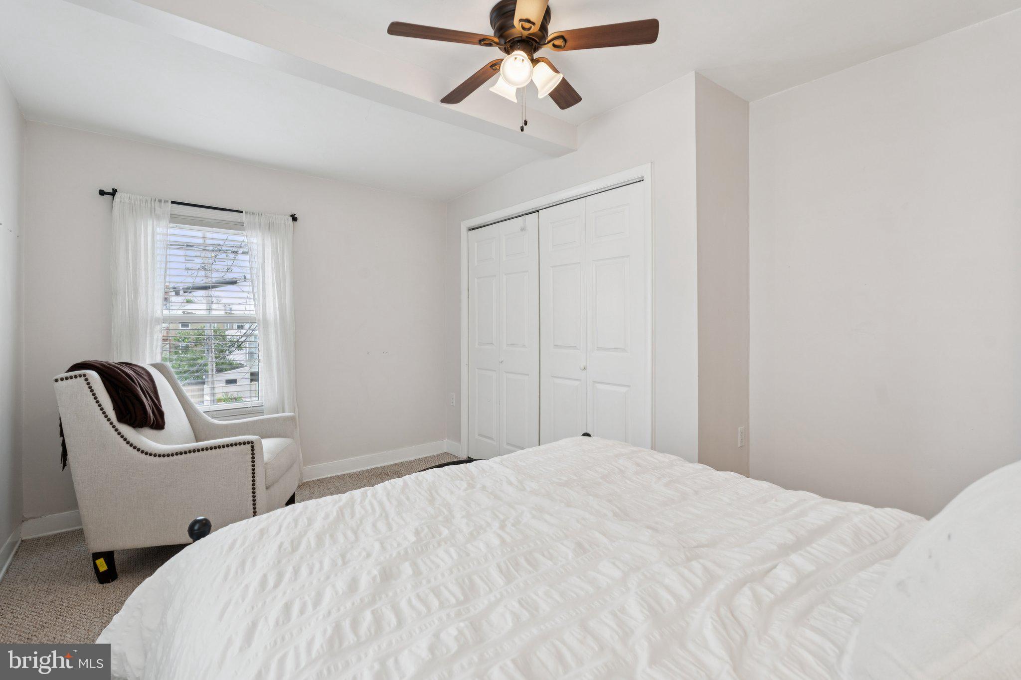 3011 O Donnell Street Baltimore, MD 21224 - Photo 30 of 33 a bedroom with a bed and a window