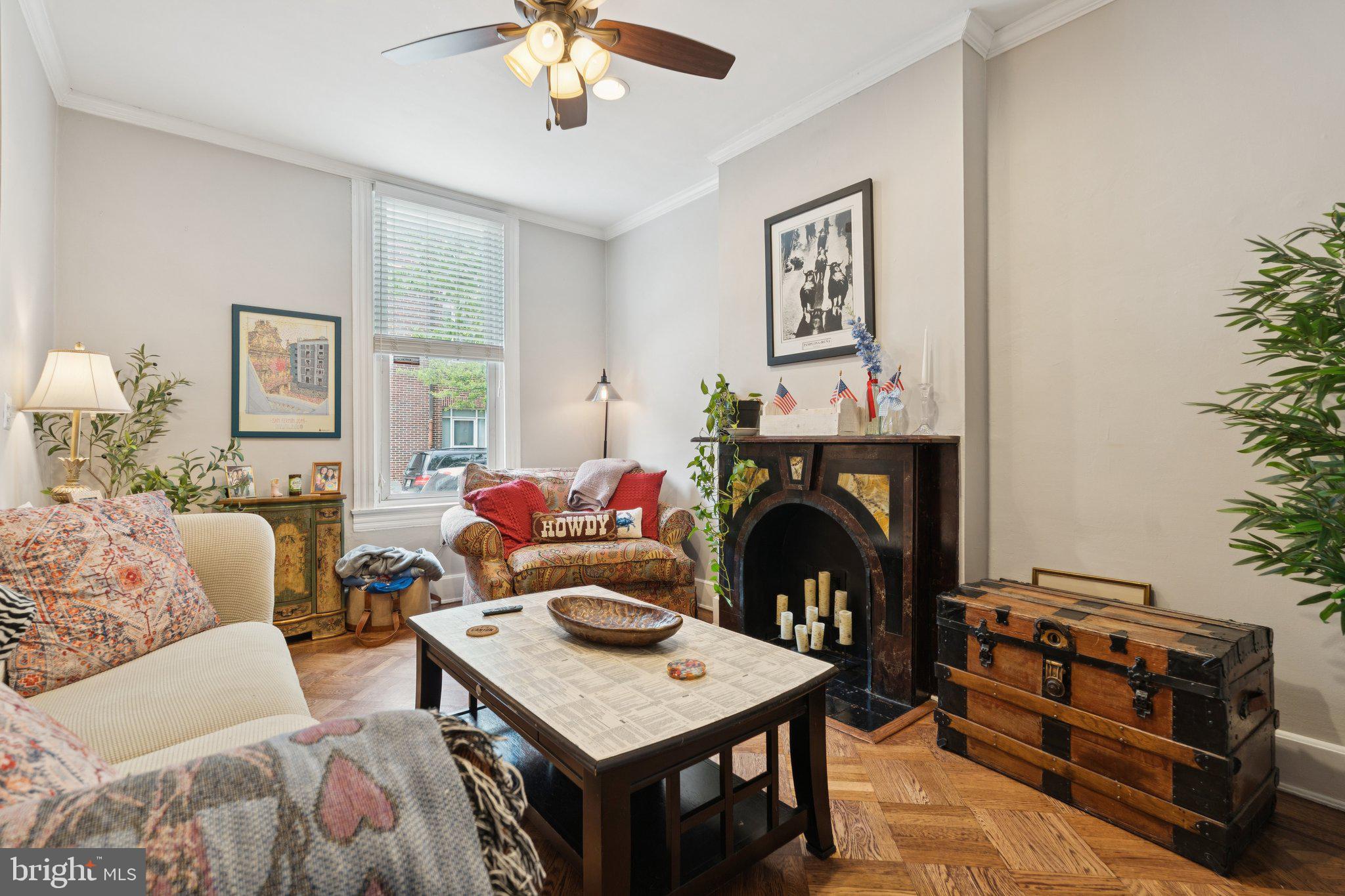 3011 O Donnell Street Baltimore, MD 21224 - Photo 4 of 33 a living room with furniture and a fireplace
