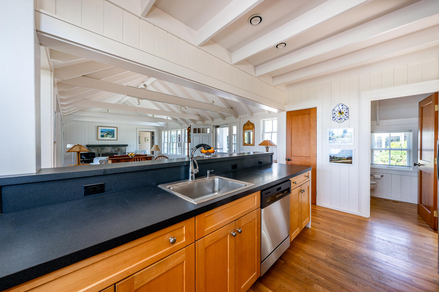 125 2nd Street Wellfleet, MA 02667 - Photo 14 of 75 a open kitchen with stainless steel appliances granite countertop a sink and wooden floors