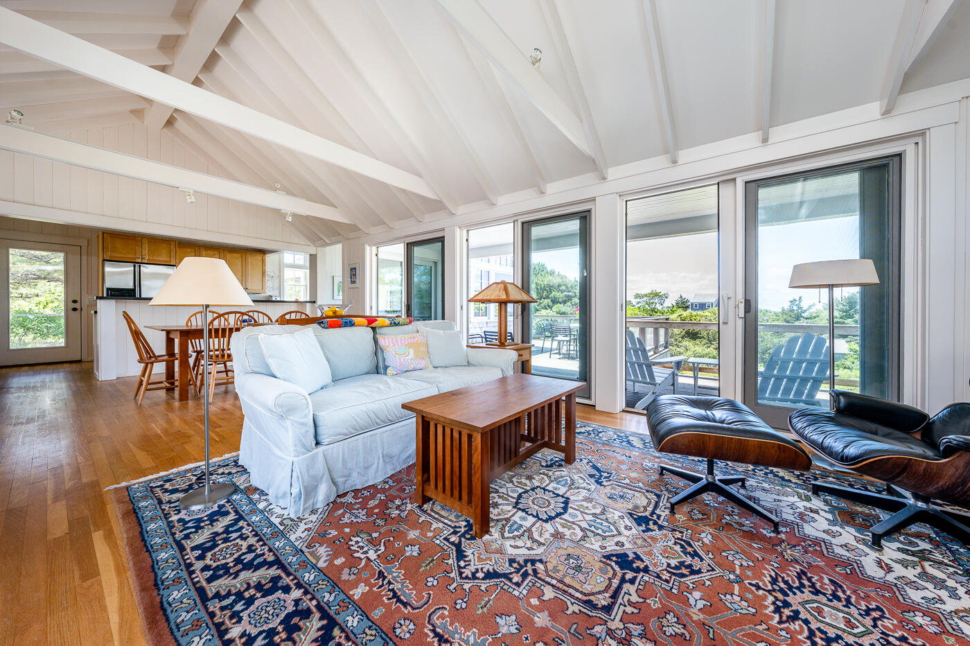 125 2nd Street Wellfleet, MA 02667 - Photo 17 of 75 a living room with furniture and a table
