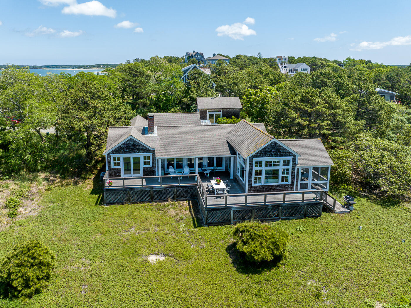 125 2nd Street Wellfleet, MA 02667 - Photo 2 of 75 a aerial view of a house with swimming pool plants and large trees